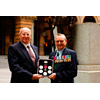 Graham Thomas (grandson of Alfred Shout VC) and Keith  VC holding the Sands of Gallipoli Men of Valour limited edition medallion set.
